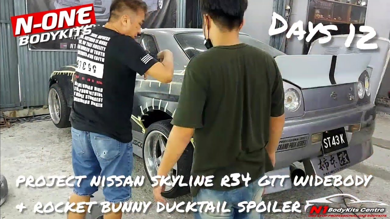 Days 12 project nissan skyline r34 gtt widebody & rocket bunny ducktail spoiler.