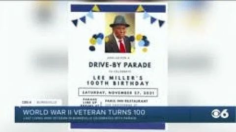 Drive-by parade honors WWII veteran's 100th birthday