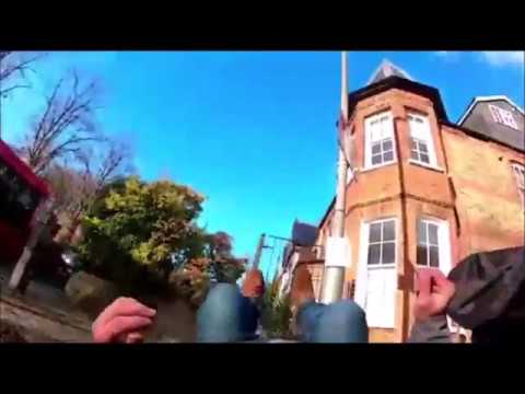 Hilarious moment biker gets so absorbed covering machine he films himself clattering into lamppost