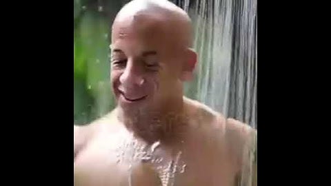ModelScope text2video - Vin Diesel taking a shower while performing various tasks