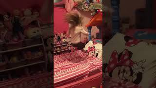 Energetic Girl Jumps And Plays On Pink Bed In Playful Room