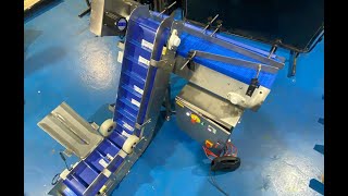 Flighted Elevator Incline to Plastic Modular Belt Conveyor from Form Fill and Seal machine