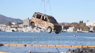 被災地で水没車両引き揚げ 防潮堤工事で発見、宮城