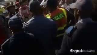 Scuffles break out in South African protests against Barack Obama