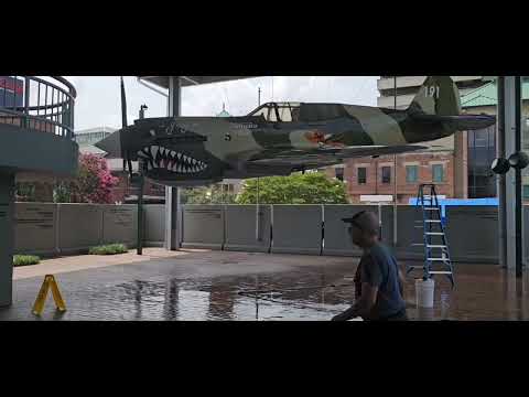 Washing Down a WWII Fighter Plane Replica