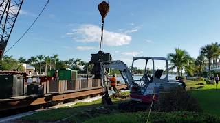 New Seawall construction with Five Dredge and Marine watching.
