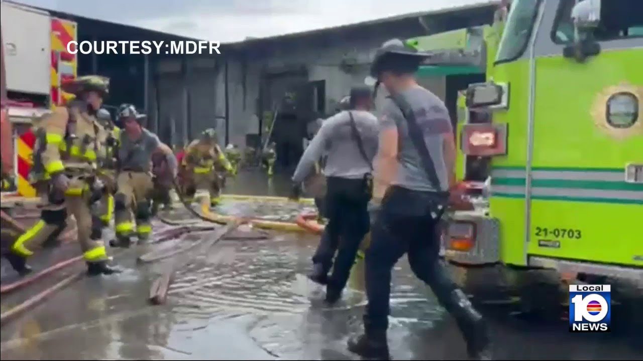 MDFR crews respond to heavy warehouse fire in Medley - YouTube