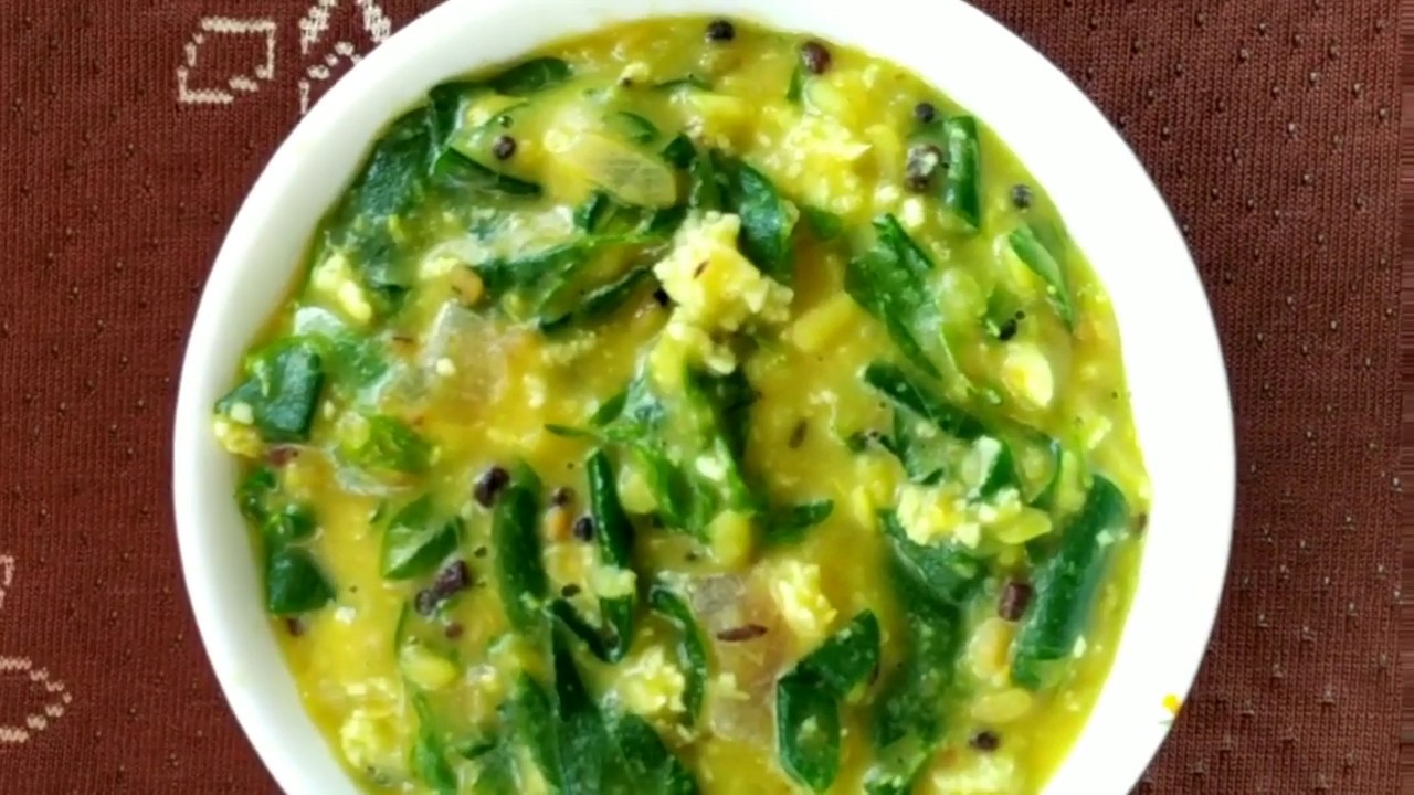 Village  style saga muga nadia/ drumstick  leaves  stir  fry  with mung  and coconut