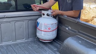 How to tie down a 20 lb propane tank.