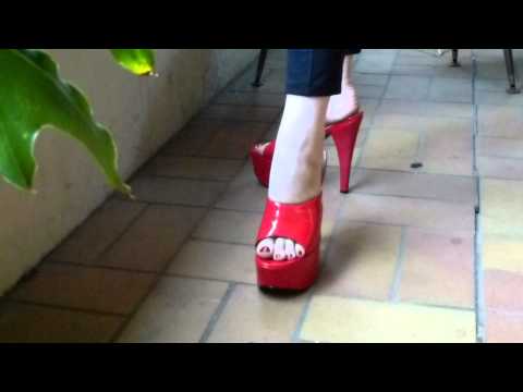 red 7 inch high heel mules