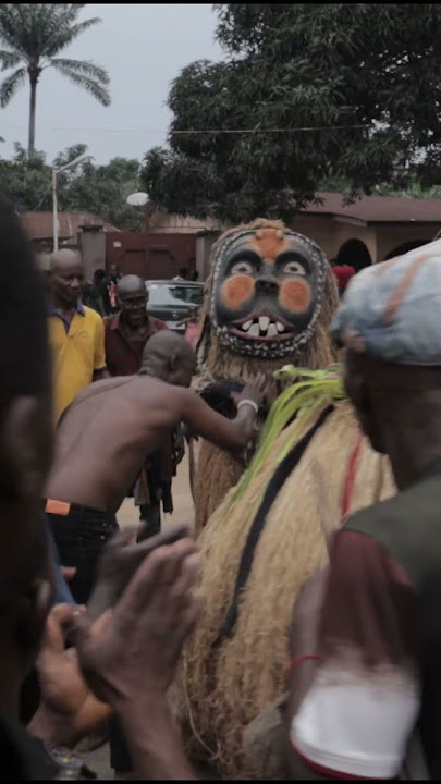 Nkakwu Kneels for Blessing from Okpoka Inyaba