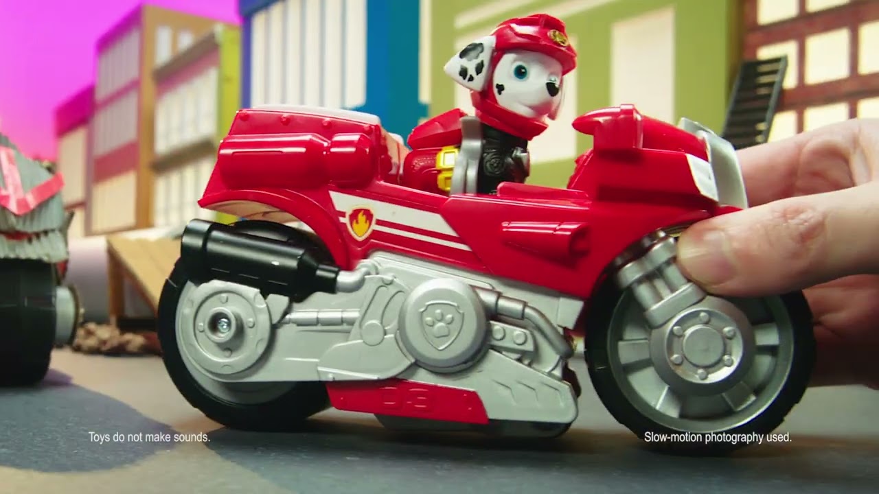 Paw Patrol, Moto Pups Deluxe de Rubble, vehículo de motocicleta de tracción  que hace piruetas, figura de juguete