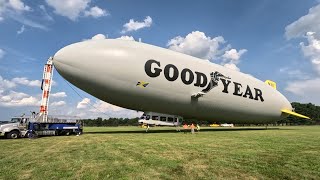 The Goodyear Blimp lands at Capital City Airport.