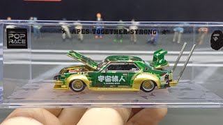 SKYLINE C210 BOSS DOG STYLE 迷彩（エイプ３０周年） Pop Race 1:64 Skyline C210 Kaido Racer Bosozuko Style – Bape 30th