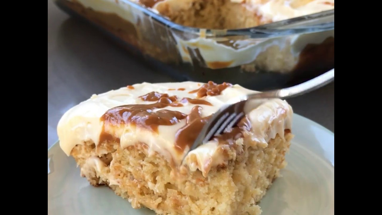 Banana caramel poke cake with cream cheese frosting