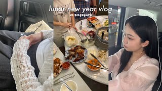 lunar new year vlog: reunion dinner mukbang, grwm for cny, temple visit, spending cny with fam