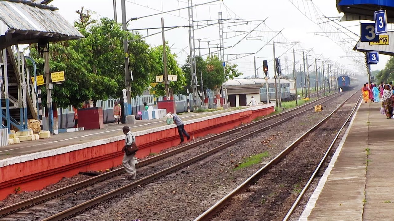 High speed WAP7 Kalka Mail chasing EMD Saraighat Express