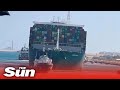 Suez Canal megaship tugboats sounds horn as it's finally FREED and moves along the canal