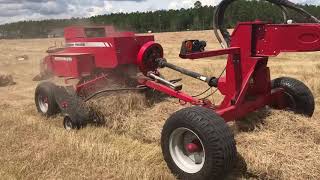 Massey Ferguson 5710 pulling twin balers