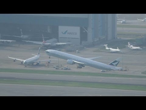 Wing Flex 777 Cathay Pacific taking off at hong kong airport airbus a220