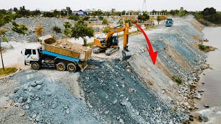 New Activities Construction of a Large Canal with Excavator and wheel loader pushing land in canal