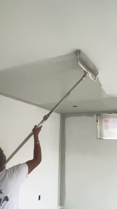 how-to-paint-ceiling-with-a-roller-applying-paint-on-ceiling-using-a