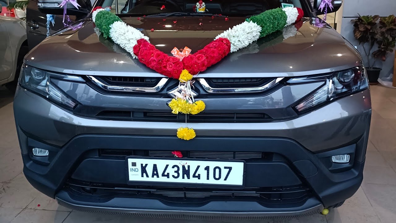 MR. MANJUNATH.M NEW BREZZA NAGMA GREY COLOUR