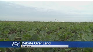 Debate Over Land