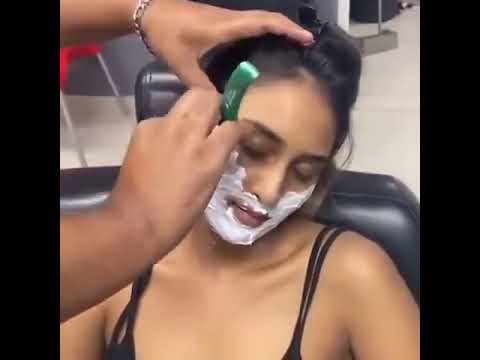 حلق الذقن عن النساء