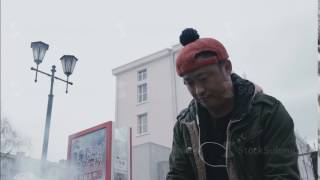 Chinese Guy In A Funny Cap With A Pompon Prepare Food On The Street