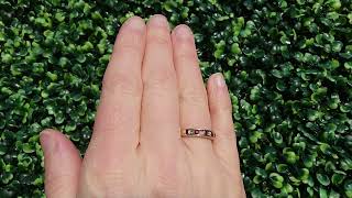 A half hoop ruby and diamond eternity ring
