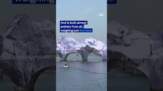 French artist JR begins inflating a giant ‘cave’ over oldest bridge in Paris | DW News