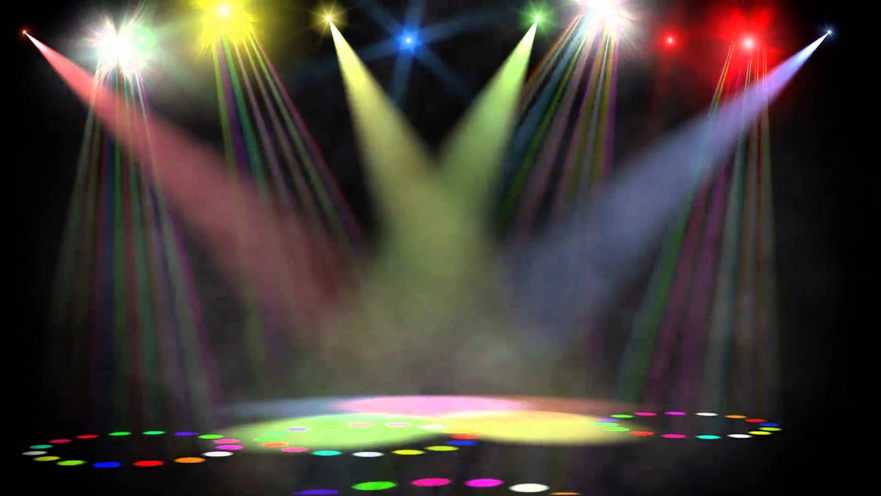 swirling colored stage spotlights YouTube