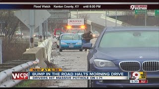 2 large potholes cause traffic headache along I-71