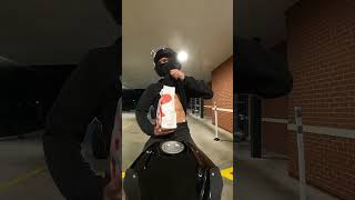 Going through a drive through on a motorcycle