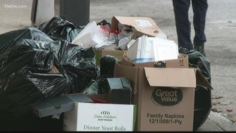 After Christmas outreach event, city workers clean up downtown park