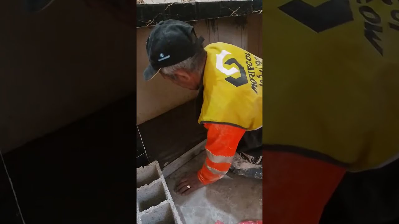 The correct way to professionally install ceramic floor tiles under the kitchen counter