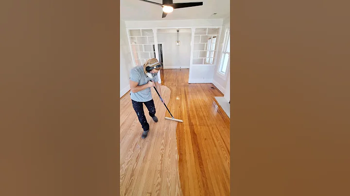 Restoring original hardwood floors by sanding and applying polyurethane (applicator link in bio)