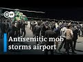 Russia blames West after antisemitic mob storms Dagestan airport | DW News