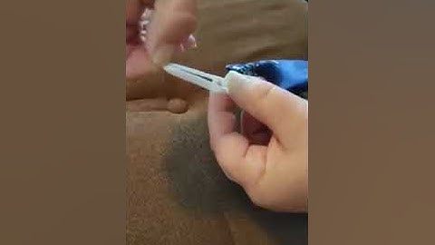 Adjusting your 2 elastic mask with bead