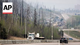 Canadian Officials Hope Shifting Winds Will Aid Wildfire Fight In Alberta