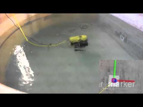 A Self-triggered Visual Servoing Model Predictive Control Scheme for Underwater Robotic Vehicles
