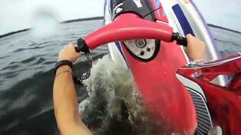 Trying NOT to sink our Jet ski during EXTREME Stunts!