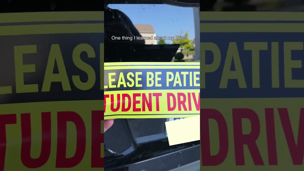 Trying to put a temporary magnetic 🧲 sign on a Toyota Prius … um ... 🤦‍♂️