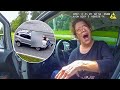 Unhinged Woman Flees From Cops With Man Hanging Onto Car