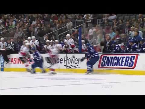 Komisarek puts Lessard over the boards - Sens vs Leafs - Sept 22nd 2010 (HD)