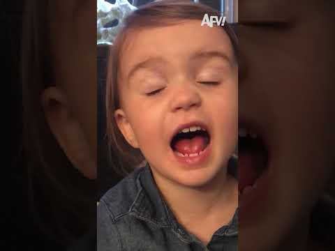 My toddler sneaks ice cubes behind her dad's back... sort of