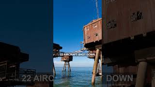 Seven towers standing in the sea, empty since 1959