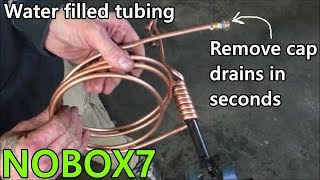 Bending copper coils FILLED WITH WATER