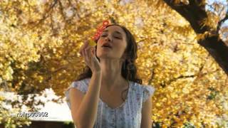 !!!!!!Woman Blowing Bubbles Stock Video Footage   Getty Image screenshot 5